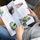 Child Holding Personalized Disney's Cars Ultimate Collection Book